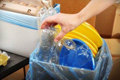 Workers managing construction waste responsibly